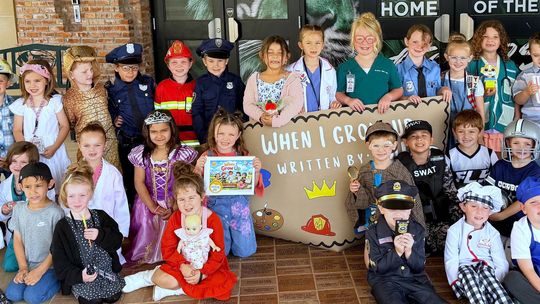 Young Authors Dress the Part for Tushka School Book Signing Party