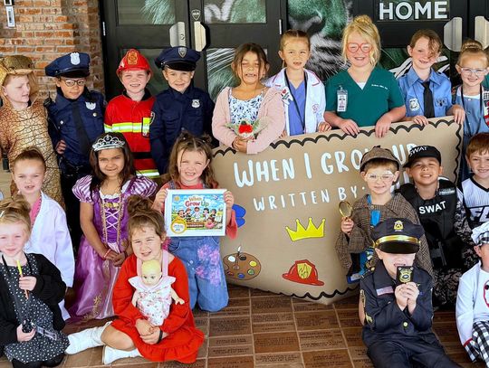Young Authors Dress the Part for Tushka School Book Signing Party