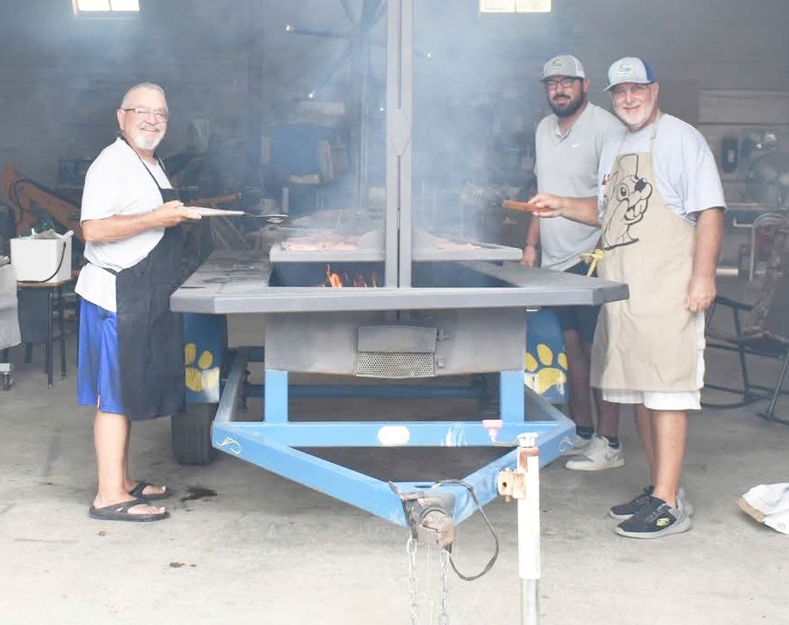 Cooking burgers for History Alive Day