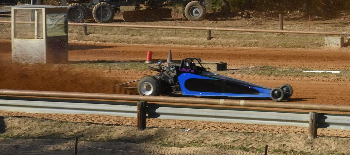 Driven to Win: The Women Throwing Sand at the Track
