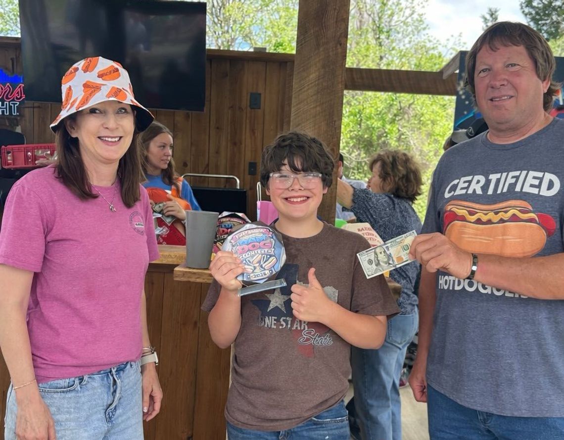 Hunter Finishes 12 Hot Dogs to Win 'Dam Dog Showdown'