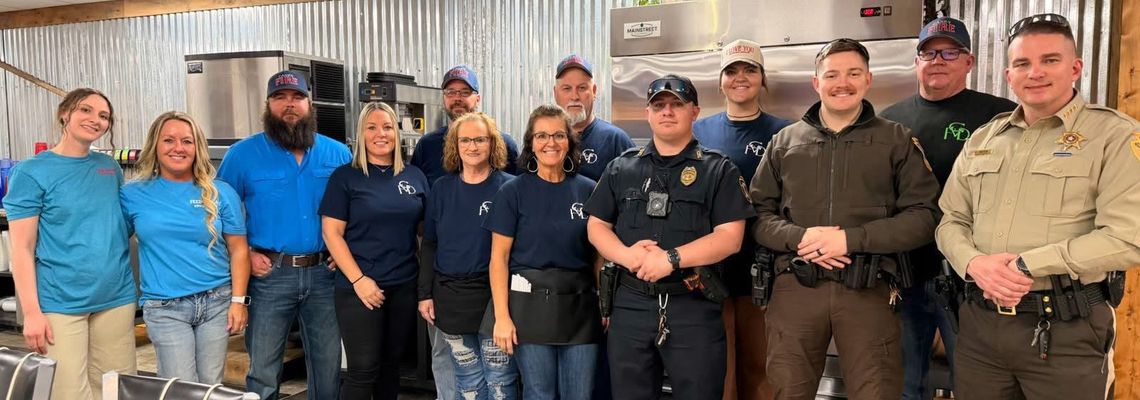 Local Law Enforcement Swaps Badges for Aprons to Support Special Olympics