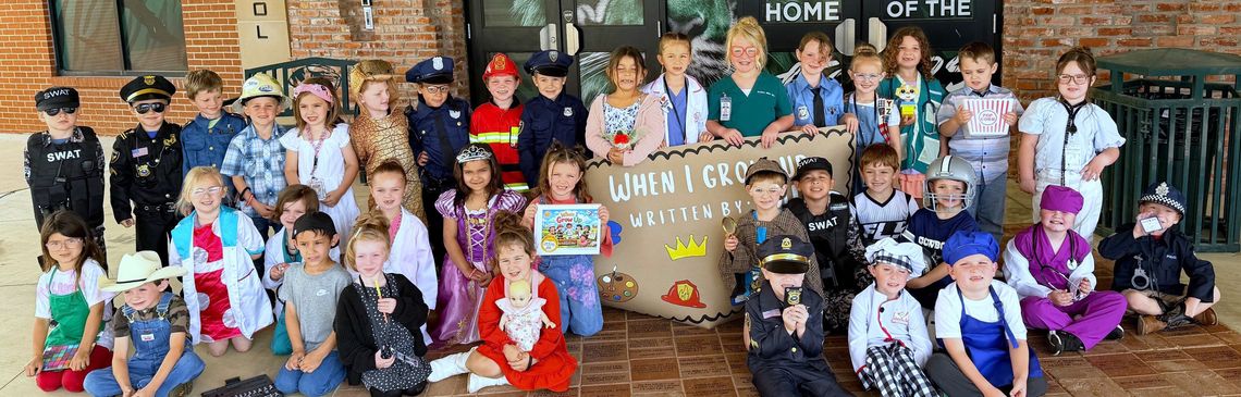 Young Authors Dress the Part for Tushka School Book Signing Party